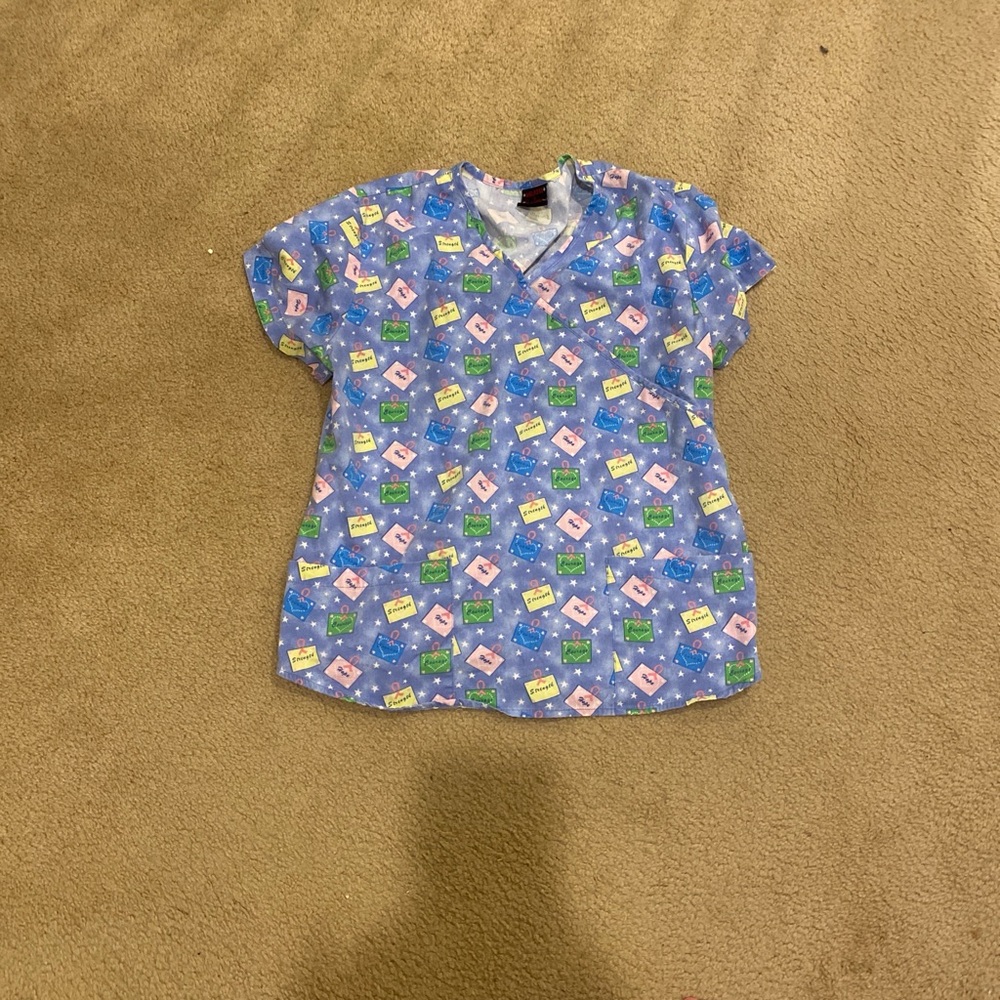 Motivational print scrub top